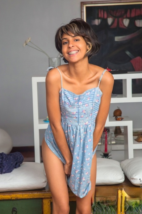 Latina teen Antonella Campos sports short hair while posing nude on a dresser 67214320