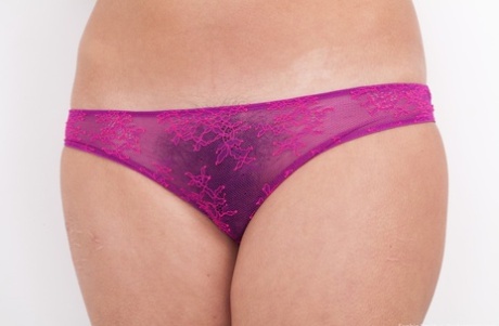 Gorgeous brunette in sheer panties spreading her hairy pussy lips wide open 70037835